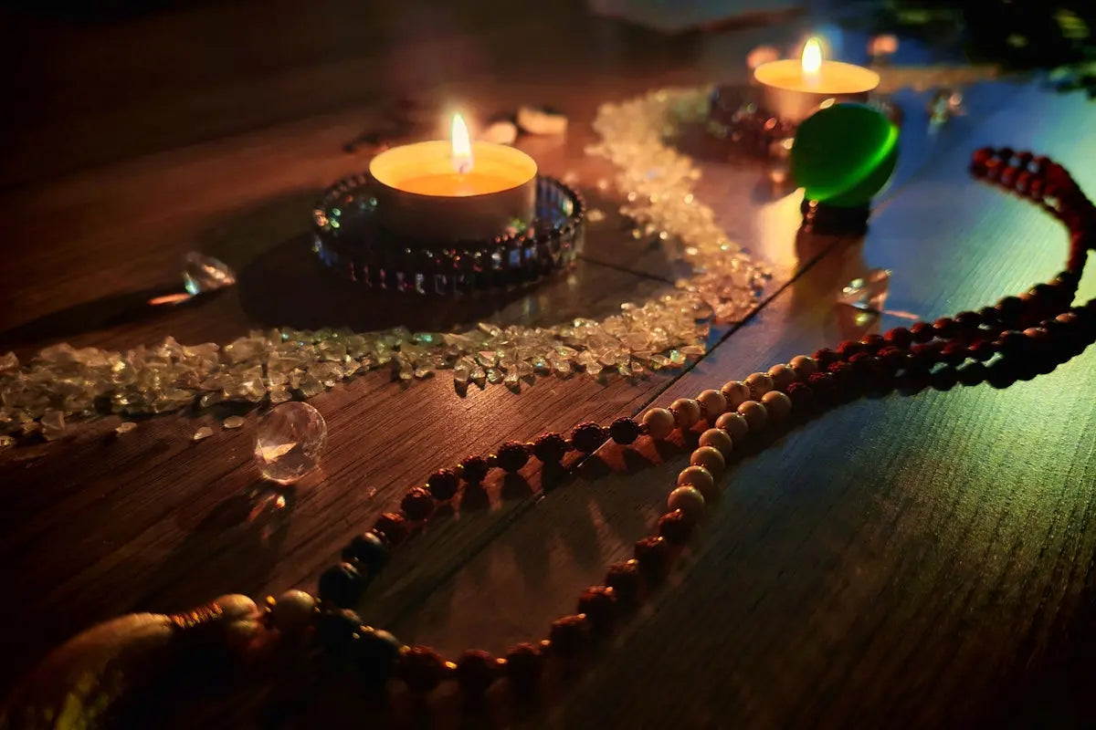 Candles, crystals, and beads create a calming ambiance.