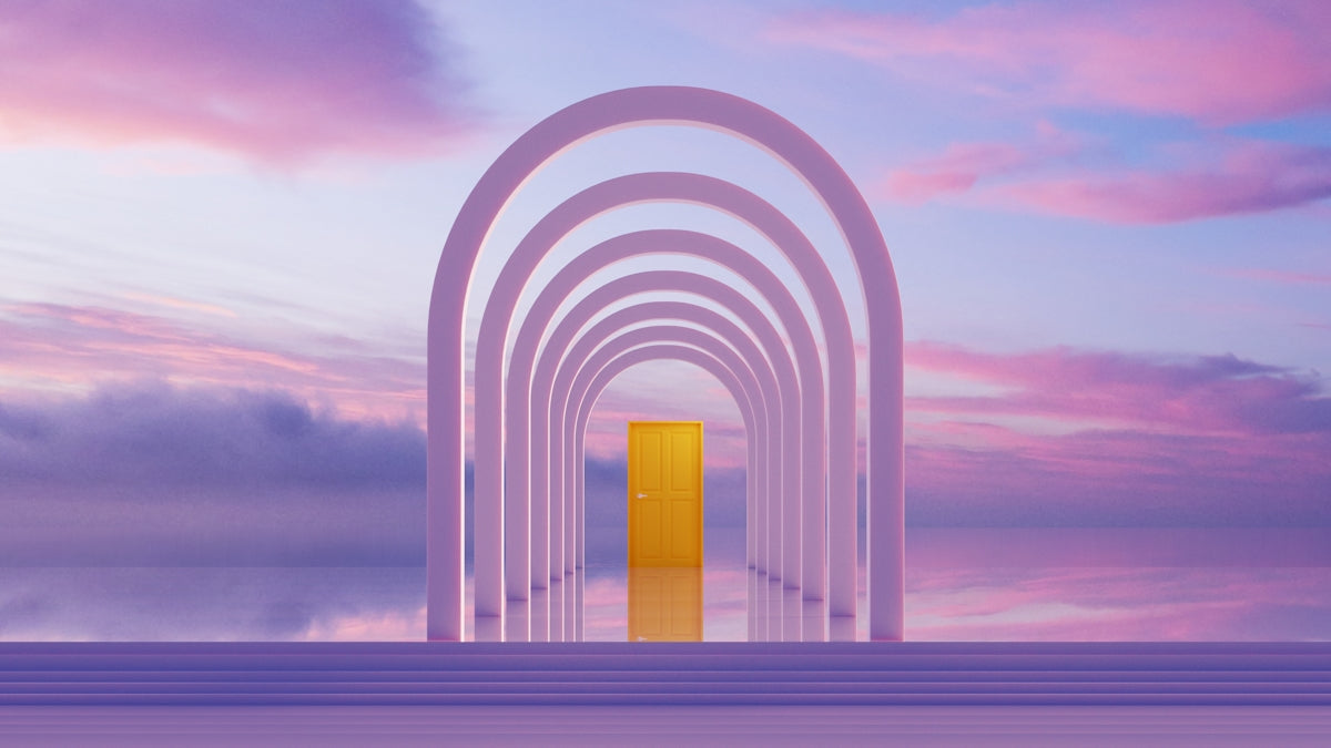 Archway leading to a golden door at sunset